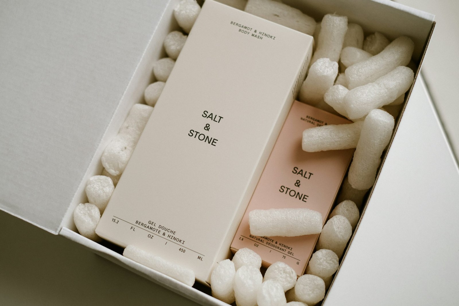a white box filled with white and pink items